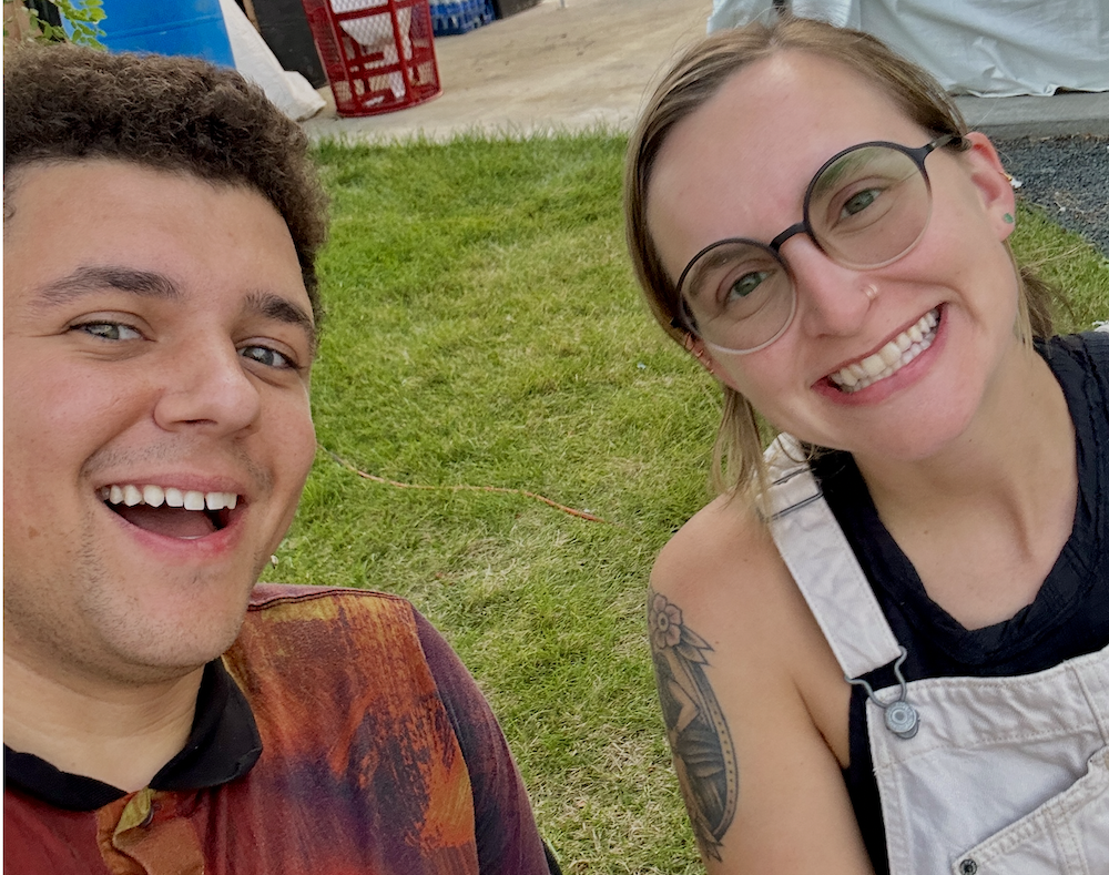 Kyle Abraham Bi (left) poses with McKenzie (right), who worked with Reflective Jewelry at Milwaukee Irish Fest since she was 11.